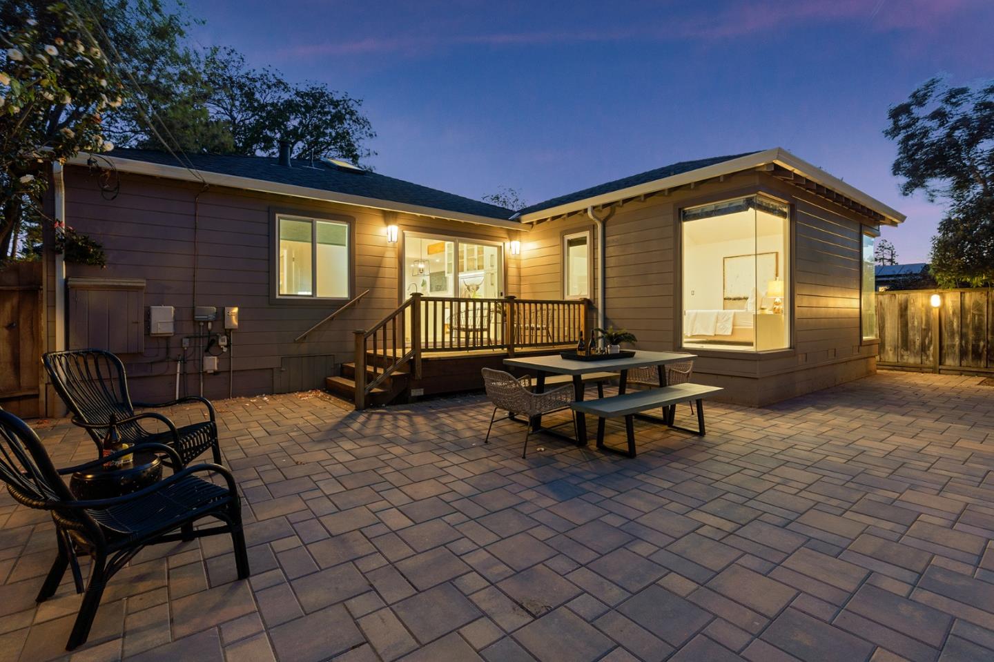 418 Dwight Road Burlingame, CA 94010 - Photo 43 of 45 a backyard of a house with table and chairs