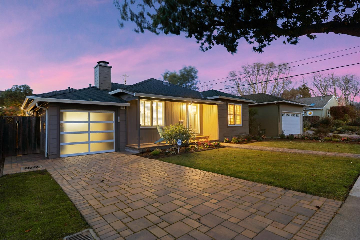 418 Dwight Road Burlingame, CA 94010 - Photo 45 of 45 a front view of a house with a garden and yard