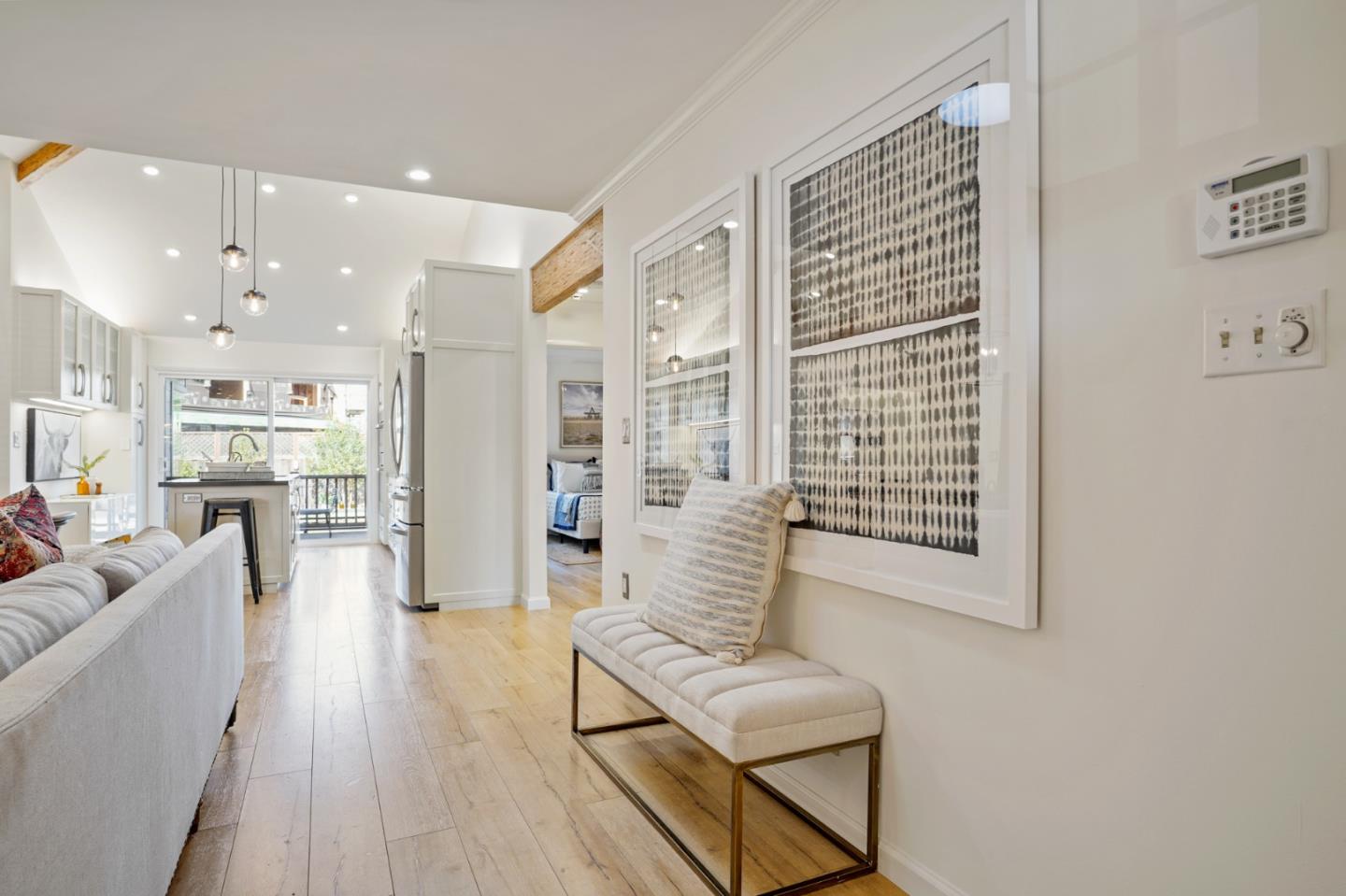 418 Dwight Road Burlingame, CA 94010 - Photo 5 of 45 a living room with furniture and a large window