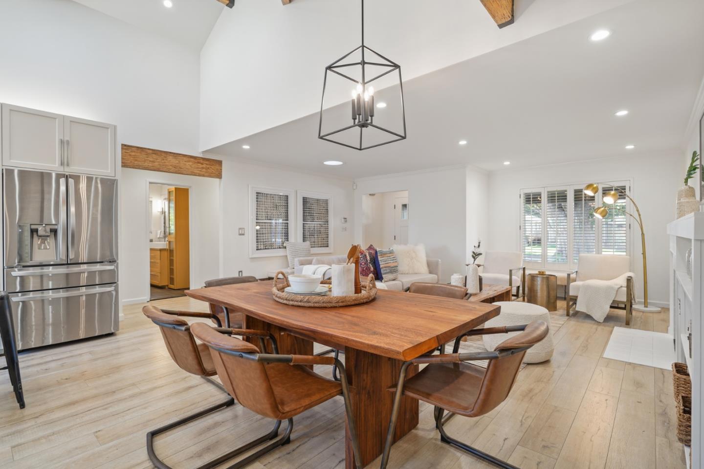 418 Dwight Road Burlingame, CA 94010 - Photo 6 of 45 a view of a dining room with furniture window and wooden floor