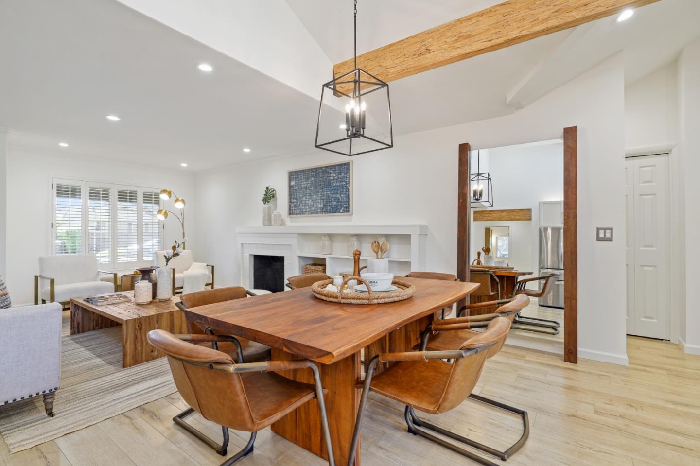 418 Dwight Road Burlingame, CA 94010 - Photo 7 of 45 a view of a dining room with furniture wooden floor and chandelier