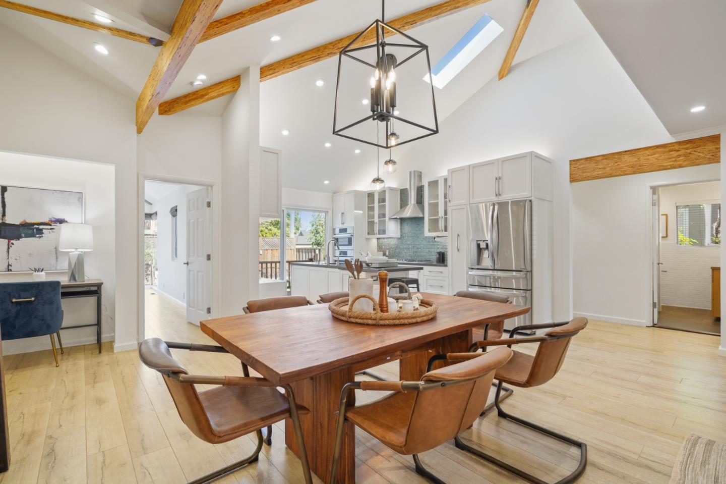 418 Dwight Road Burlingame, CA 94010 - Photo 10 of 45 a view of a dining room with furniture and wooden floor
