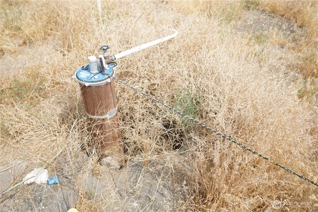 a view of a outdoor space with a sink and mirror