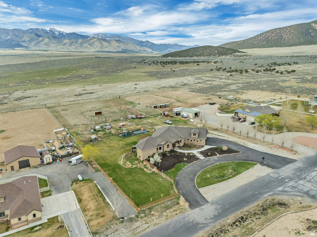 3054 West Ridgeline Road Stockton, UT 84071 - Photo 67 of 88 Overview of rural landscape featuring a mountain backdrop and nearby suburban area