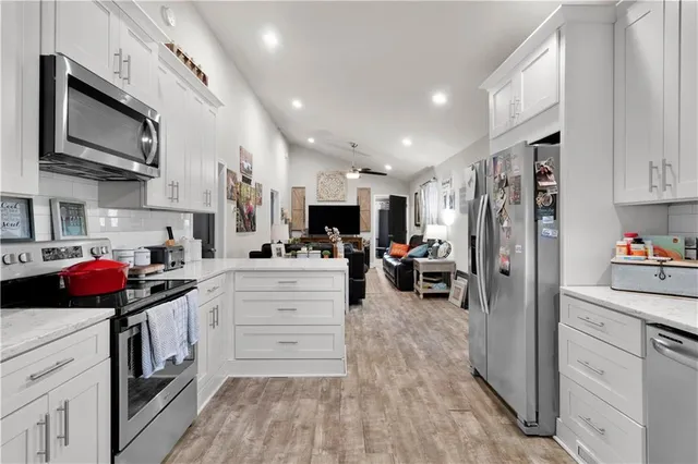 a living room with furniture and a table