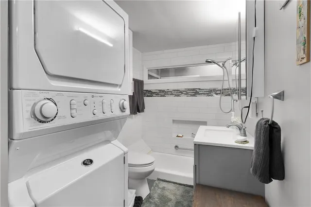 a bathroom with a shower and a tub