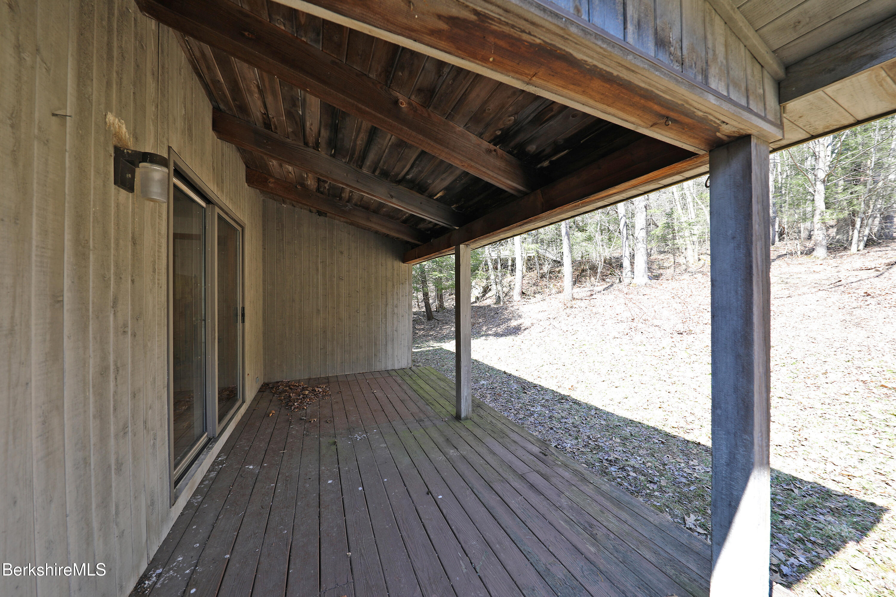 519 Kirchner Road Dalton, MA 01226 - Photo 11 of 42 a view of empty room with wooden floor and fan