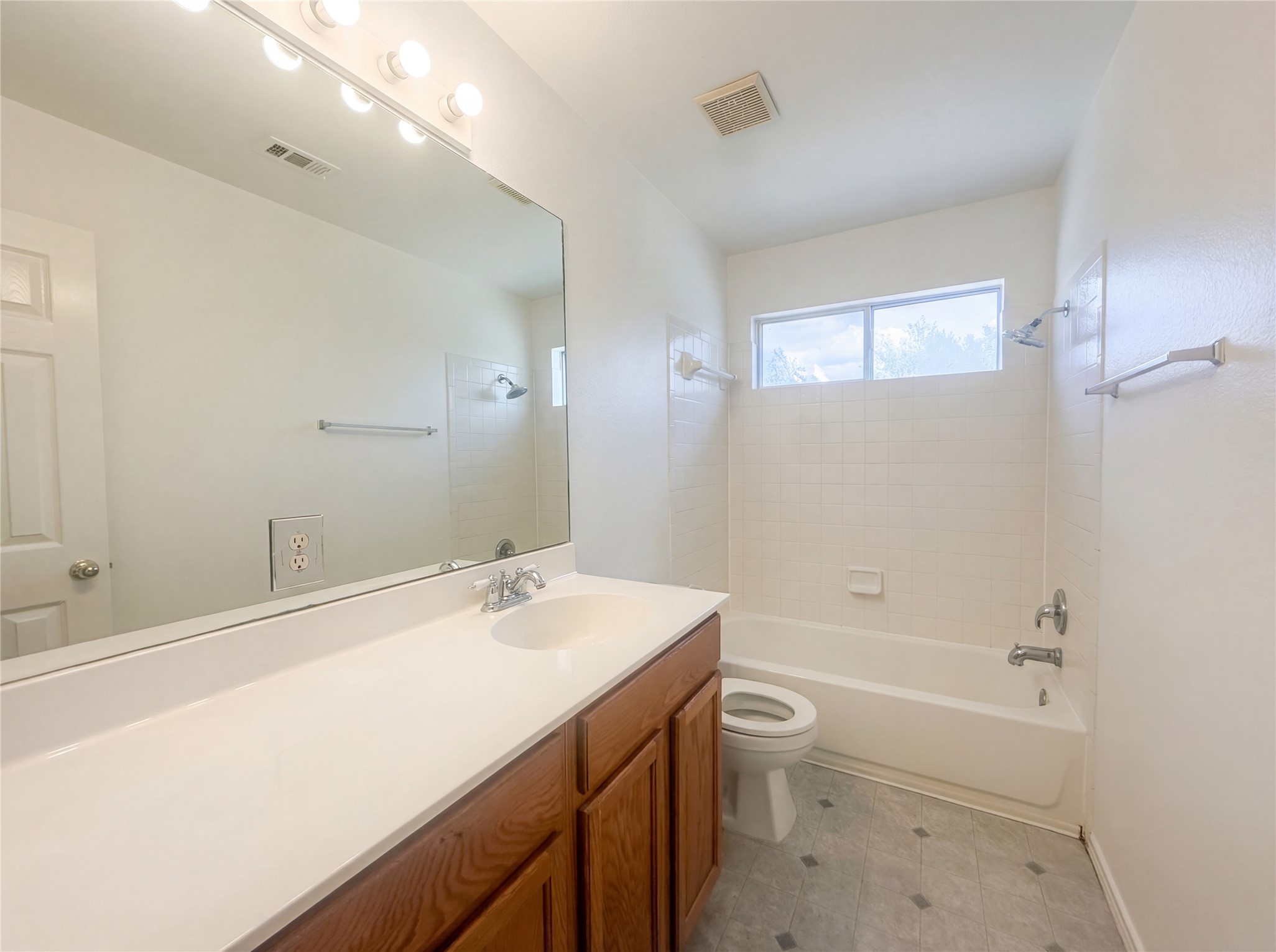 110 Strawn Kyle, TX 78640 - Photo 16 of 22 Full bath featuring vanity and bathtub / shower combination