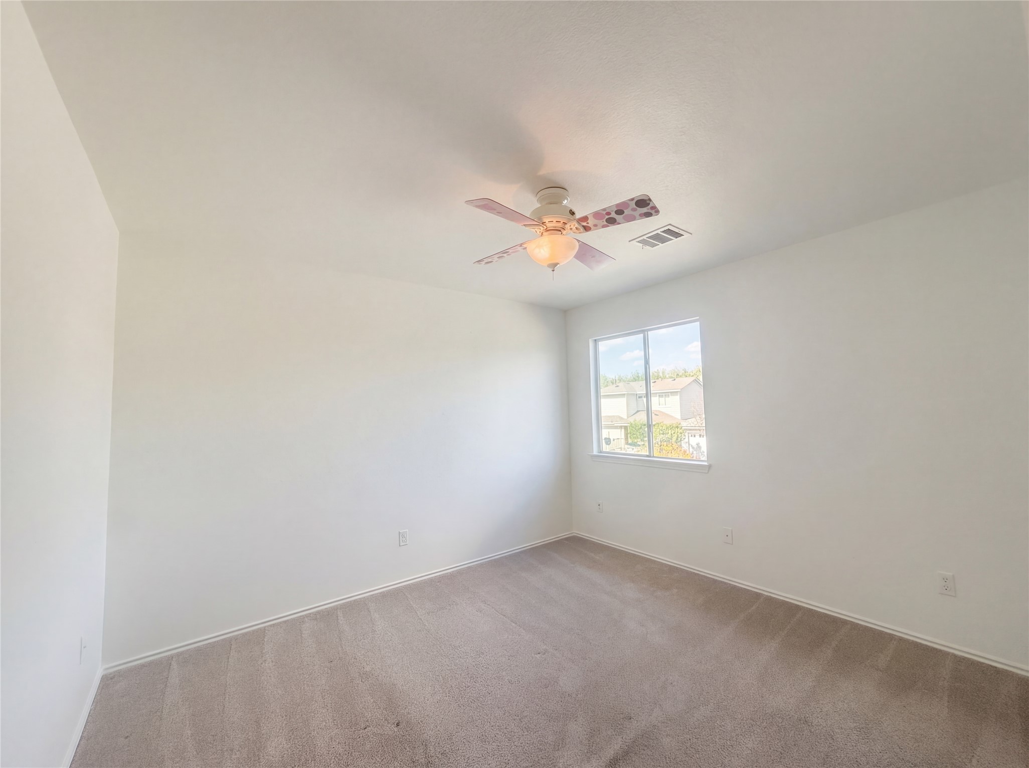 110 Strawn Kyle, TX 78640 - Photo 19 of 22 Empty room featuring carpet and ceiling fan