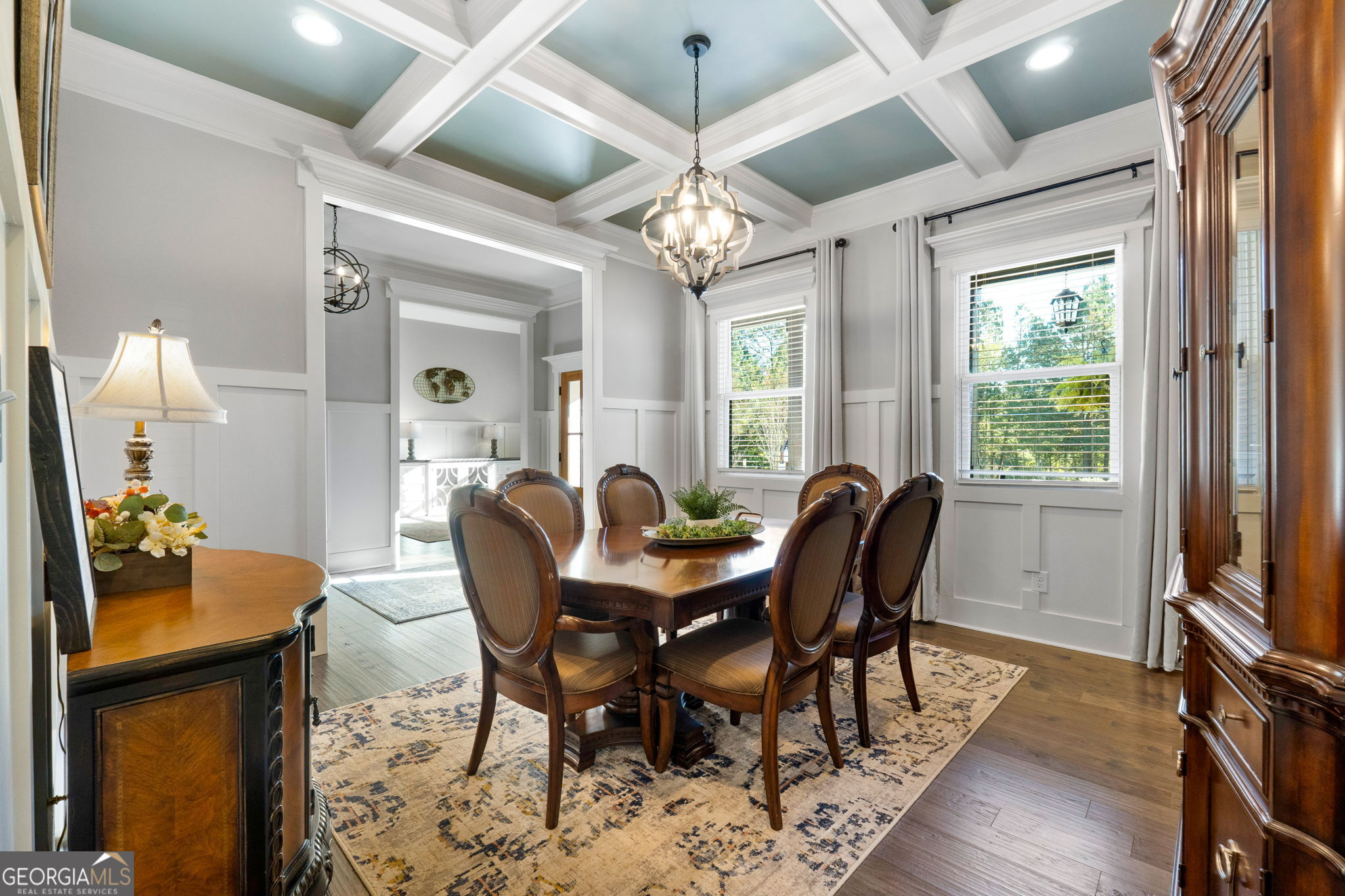 173 Dolly Nixon Road Senoia, GA 30276 - Photo 24 of 105 a view of a dining room with furniture and a chandelier