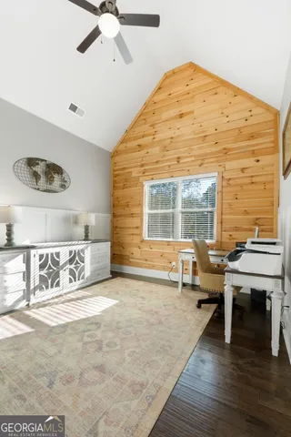 a bathroom with double sink and a mirror