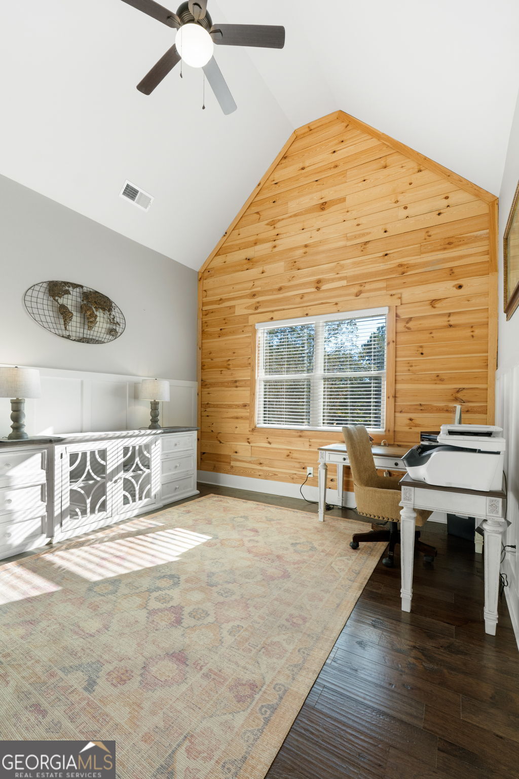 173 Dolly Nixon Road Senoia, GA 30276 - Photo 26 of 105 a view of workspace with a window and wooden floor