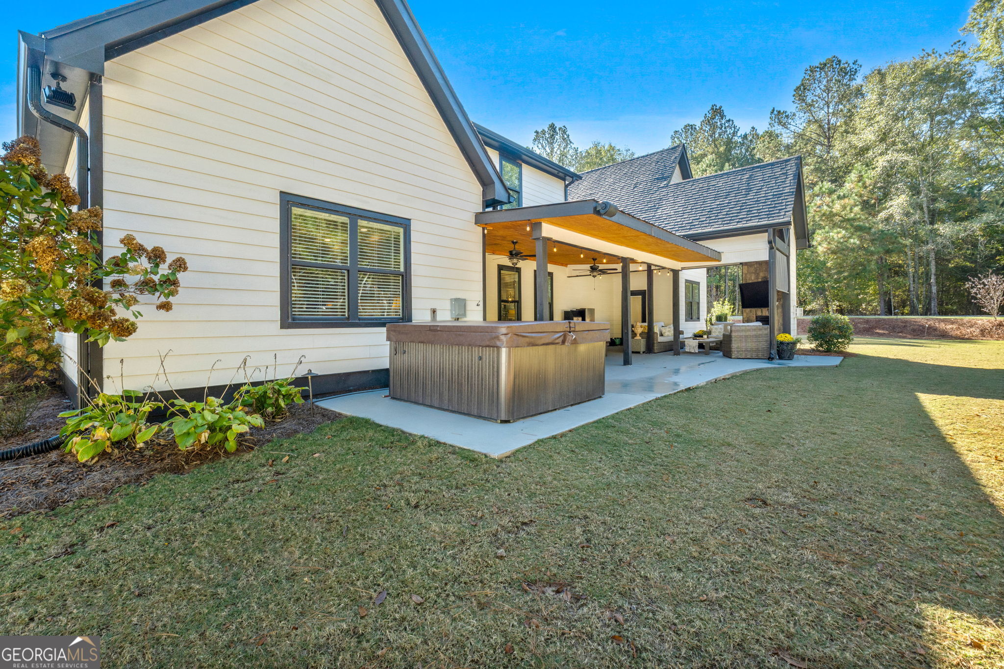 173 Dolly Nixon Road Senoia, GA 30276 - Photo 84 of 105 a view of a house with a big yard and potted plants