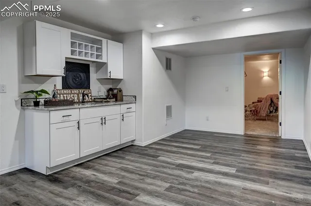 a view of a kitchen with electric appliances