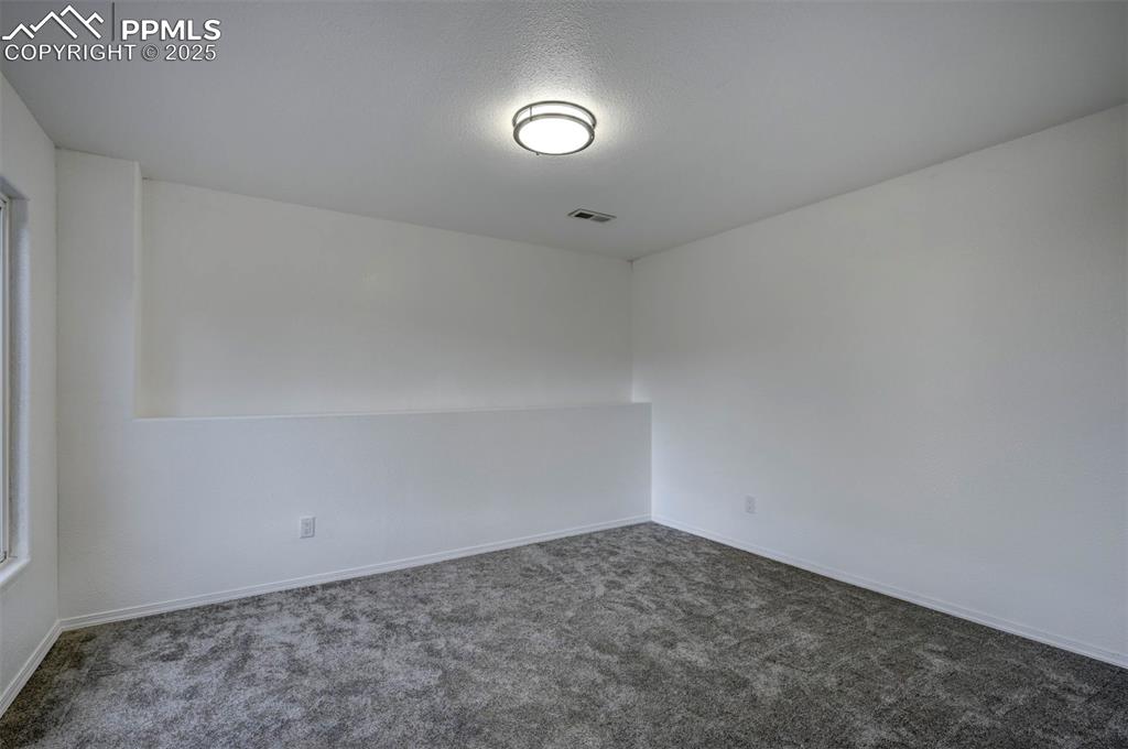 7790 Julynn Road Colorado Springs, CO 80919 - Photo 41 of 50 a view of an empty room