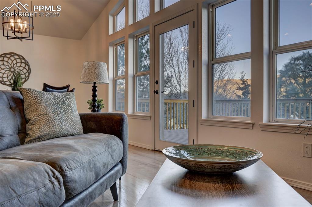 7790 Julynn Road Colorado Springs, CO 80919 - Photo 9 of 50 a living room with furniture and a large window