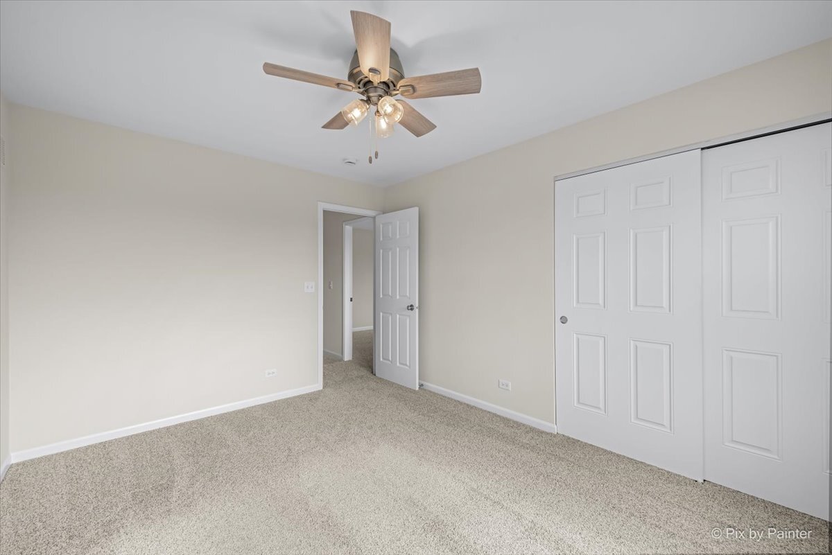 216 Winding Trail Genoa, IL 60135 - Photo 27 of 52 a view of a livingroom with a ceiling fan