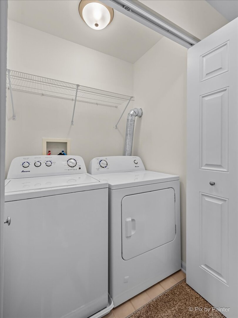 216 Winding Trail Genoa, IL 60135 - Photo 33 of 52 a utility room with dryer and washer