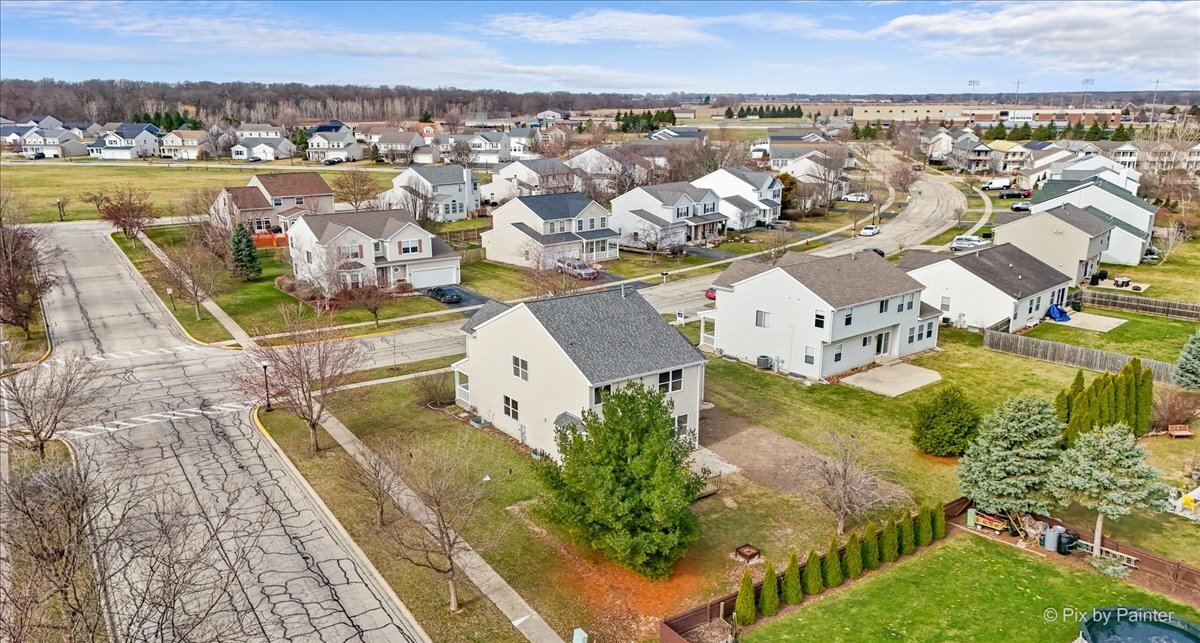 216 Winding Trail Genoa, IL 60135 - Photo 46 of 52 an aerial view of residential houses with outdoor space