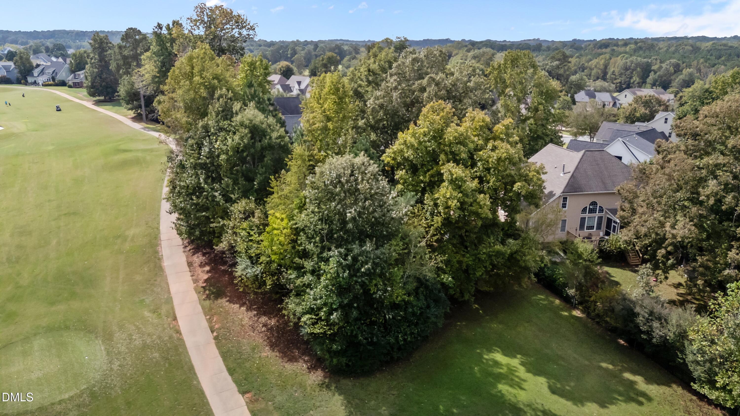 442 Waterville Street Raleigh, NC 27603 - Photo 11 of 22 a view of a lake with a mountain in the background