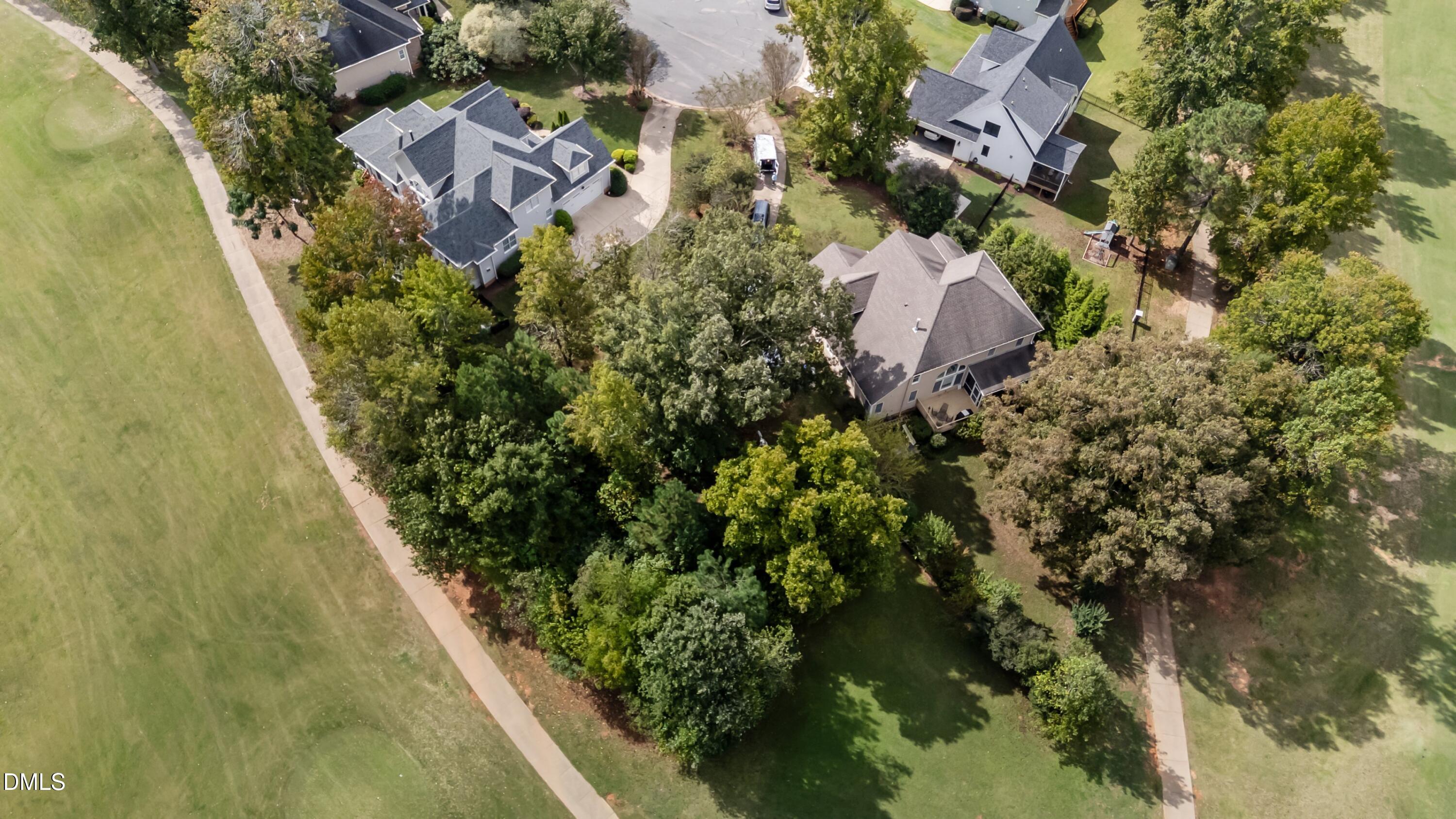 442 Waterville Street Raleigh, NC 27603 - Photo 12 of 22 an aerial view of residential house with outdoor space and trees all around