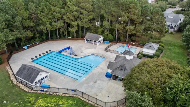 an outdoor sitting area with furniture