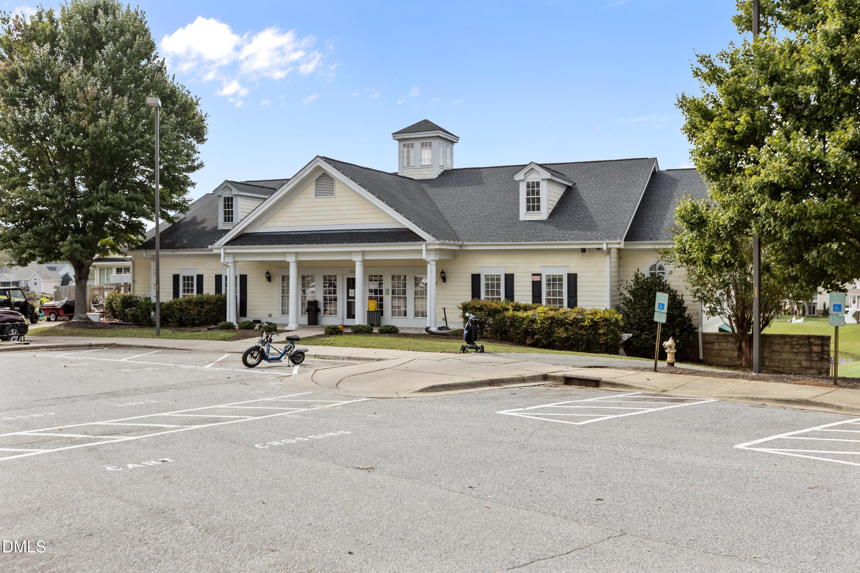 442 Waterville Street Raleigh, NC 27603 - Photo 16 of 22 a view of a house with a outdoor space and a car parked