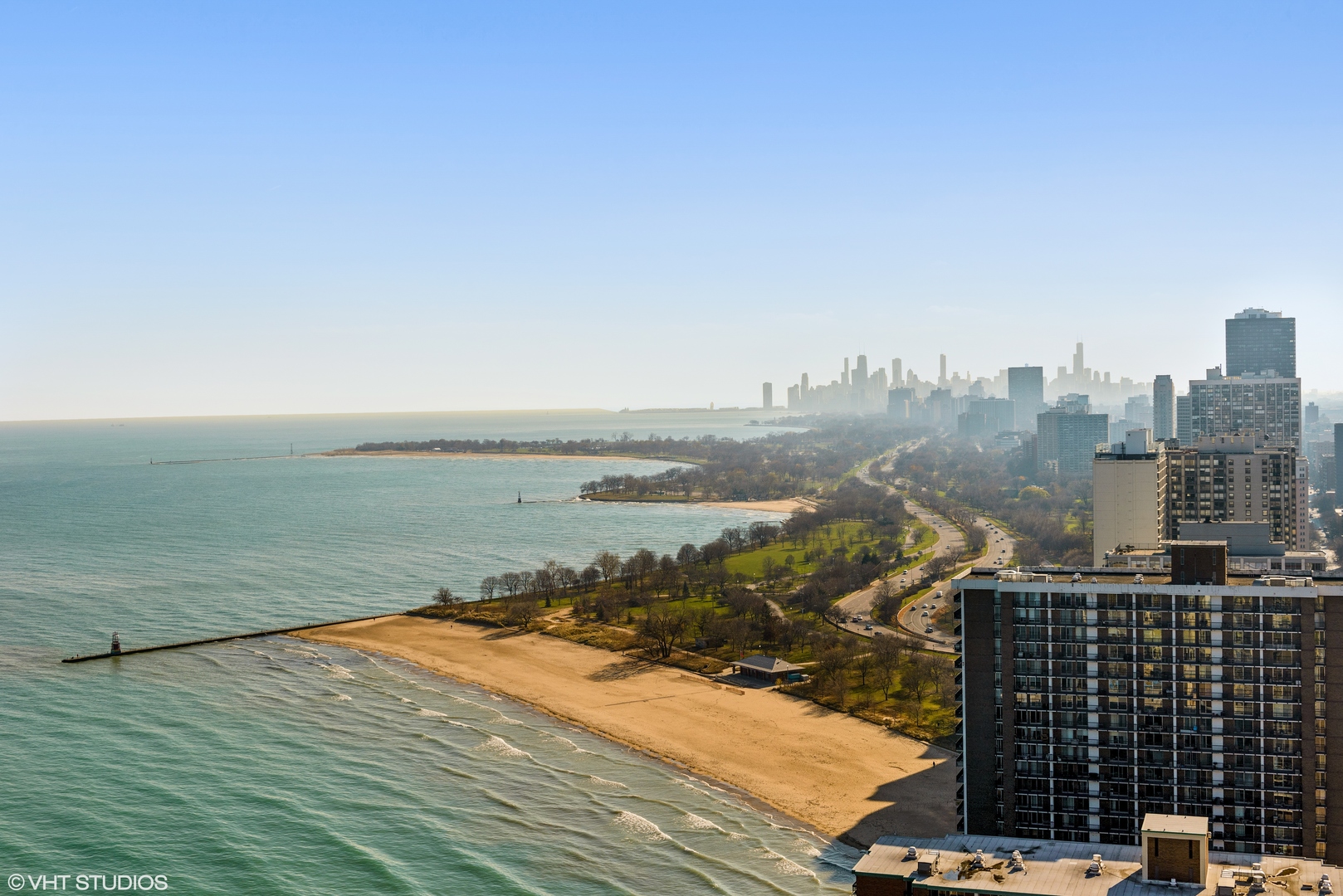 6007 North Sheridan Road, Unit 37J Chicago, IL 60660 - Photo 12 of 26 a view of a ocean with city