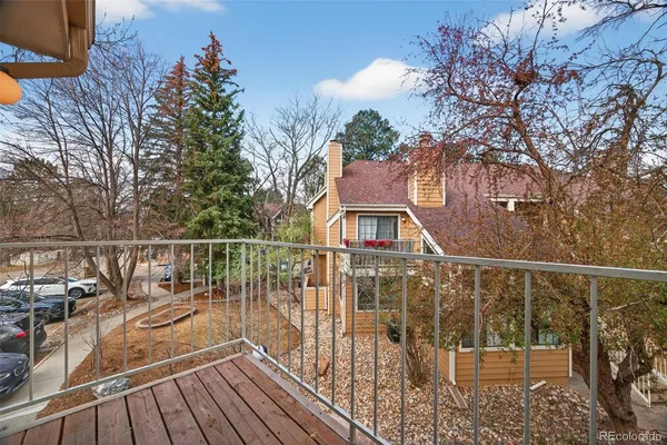 a view of street with parked cars