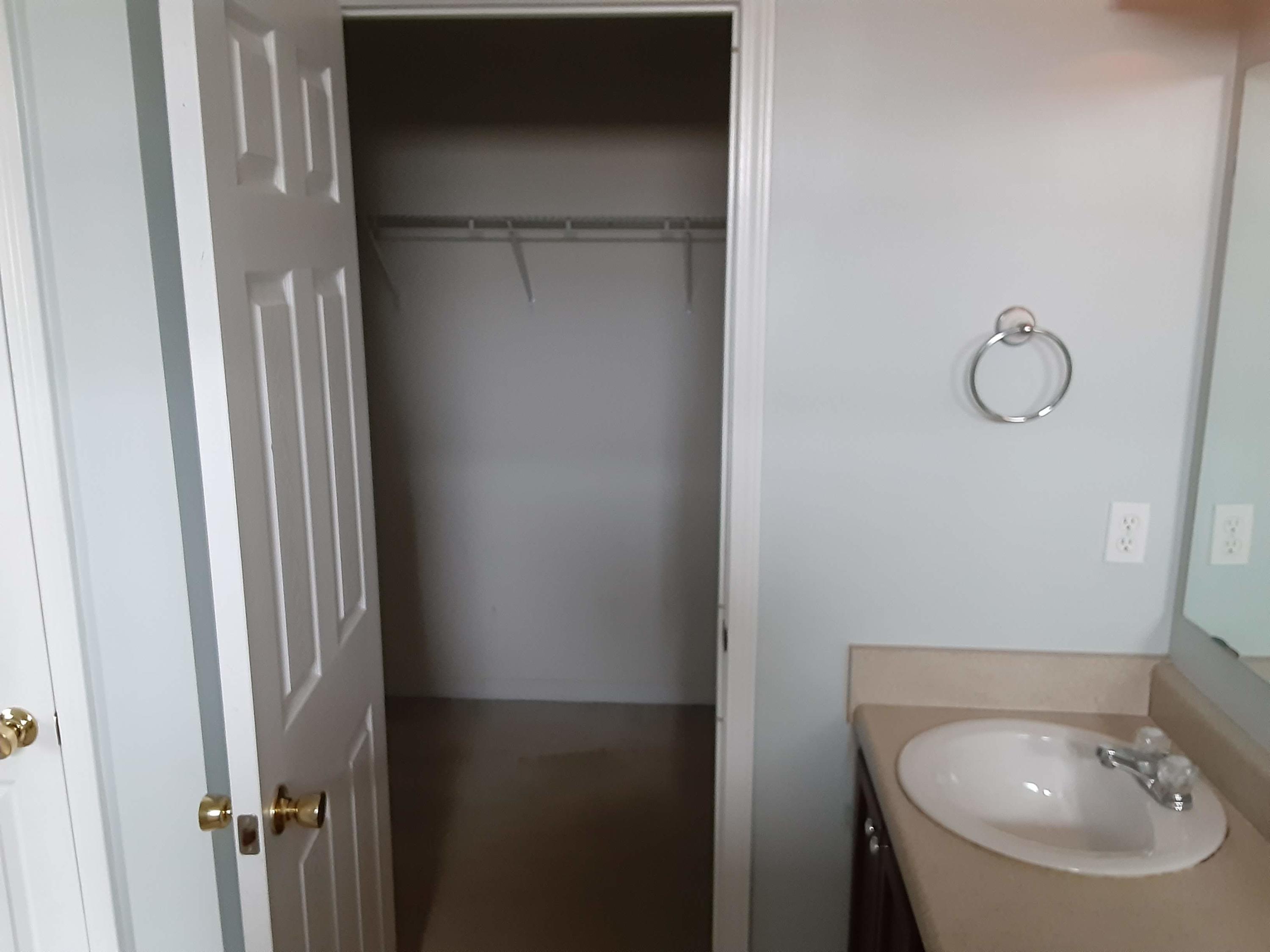 237 Limestone Circle Crestview, FL 32539 - Photo 13 of 15 a bathroom with a sink and mirror