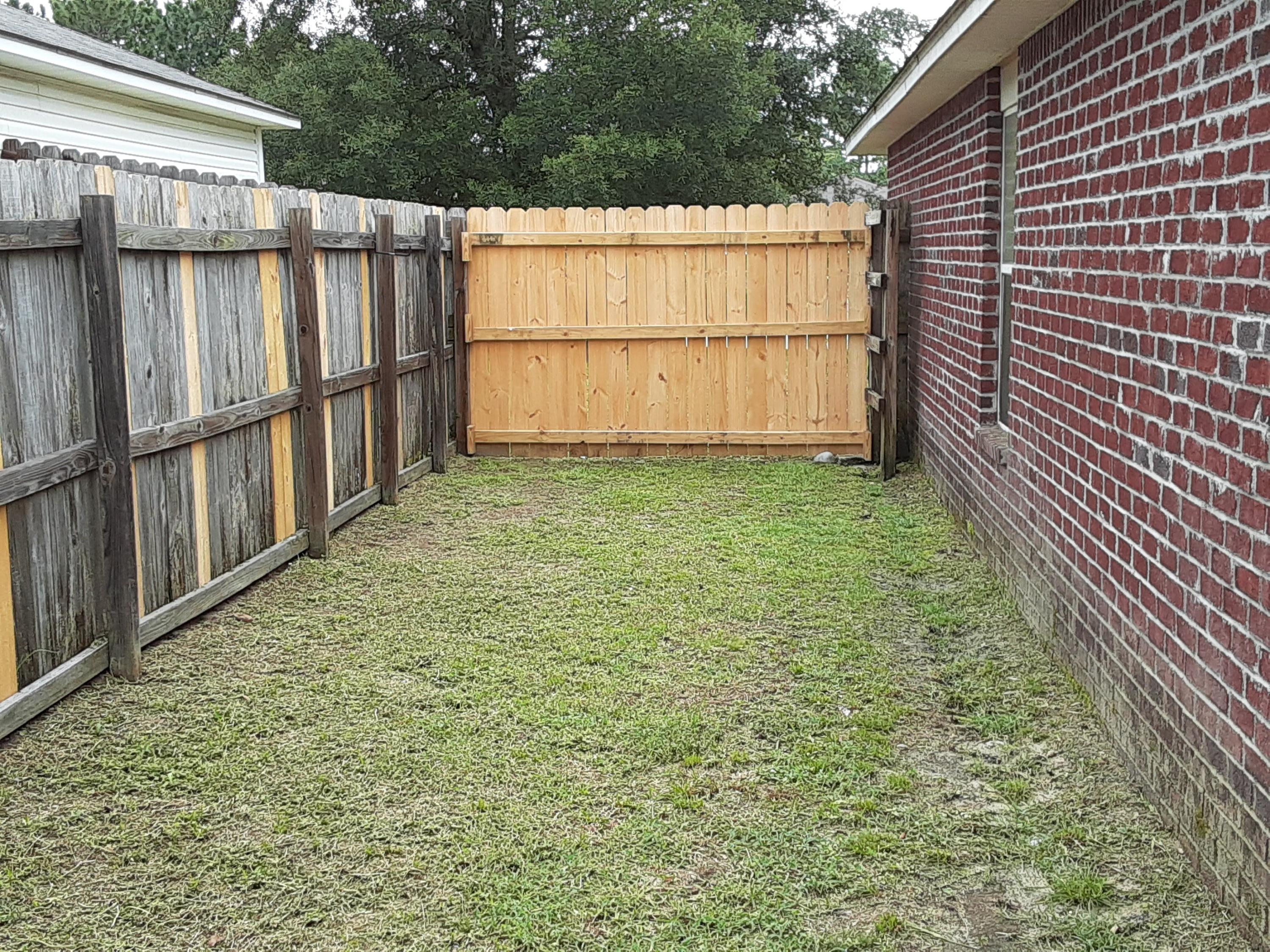237 Limestone Circle Crestview, FL 32539 - Photo 15 of 15 a view of a backyard