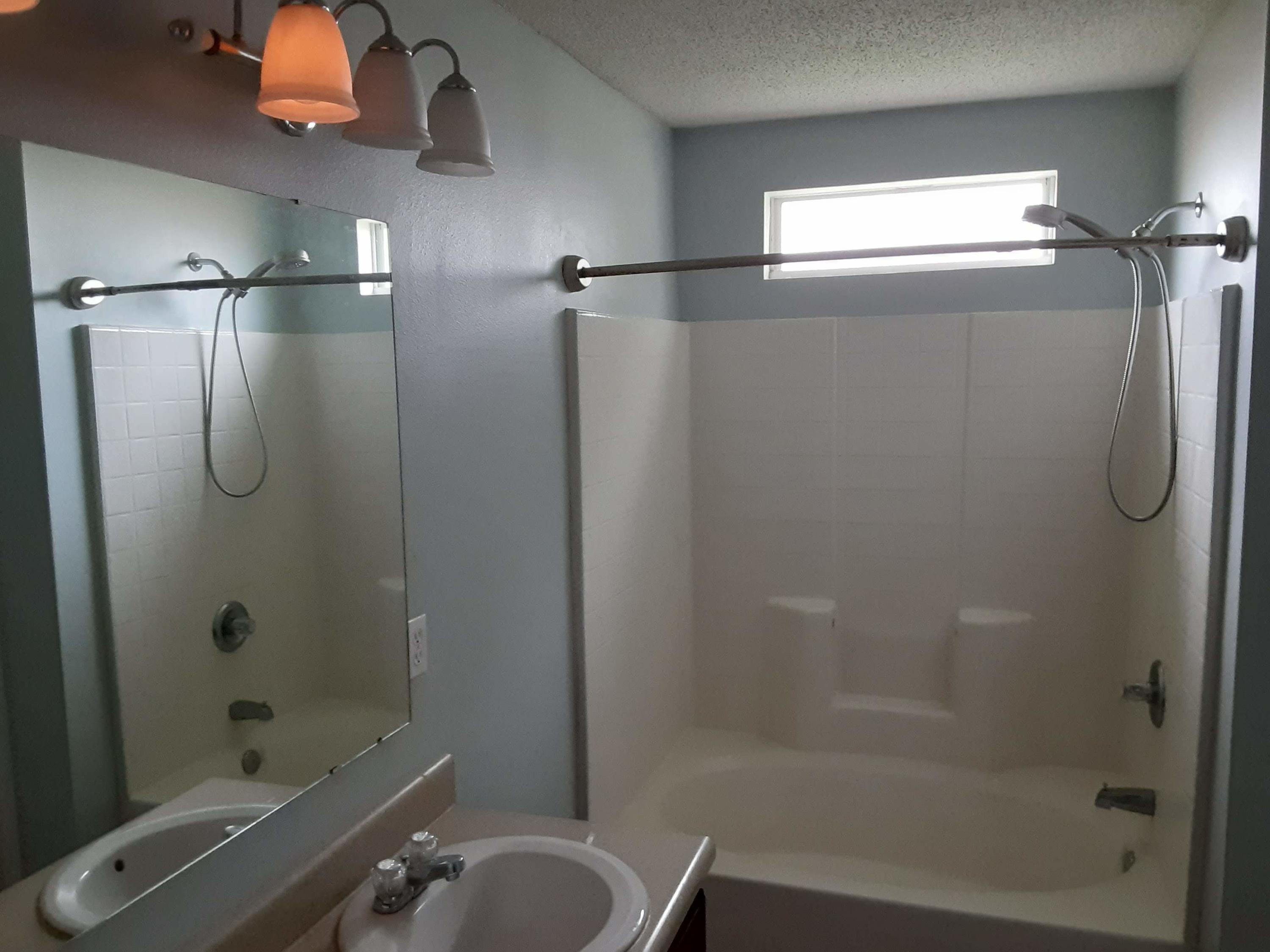 237 Limestone Circle Crestview, FL 32539 - Photo 7 of 15 a bathroom with a shower and a toilet