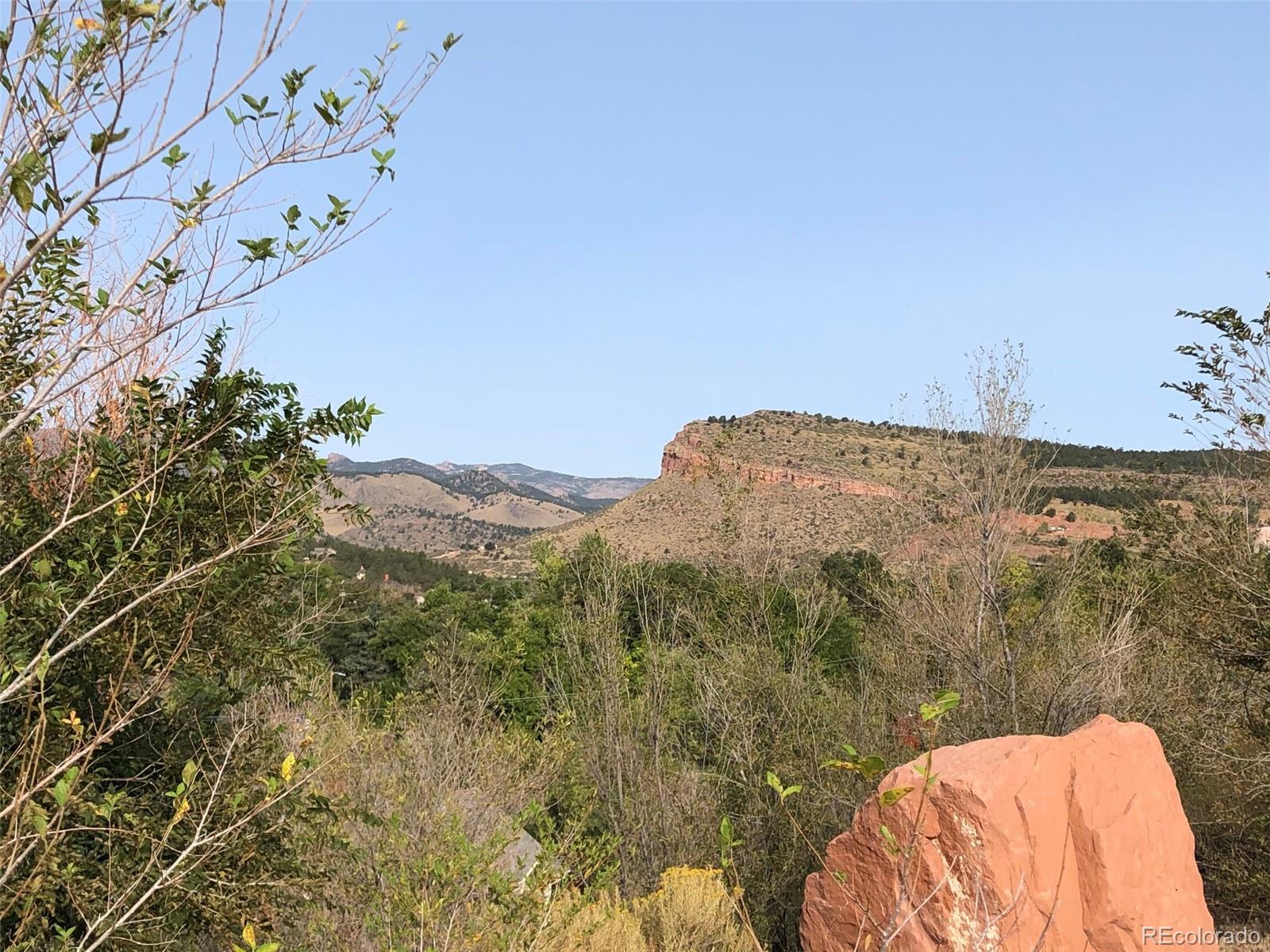620 Overlook Drive Lyons, CO 80540 - Photo 5 of 11 a view of a dry yard with wooden fence