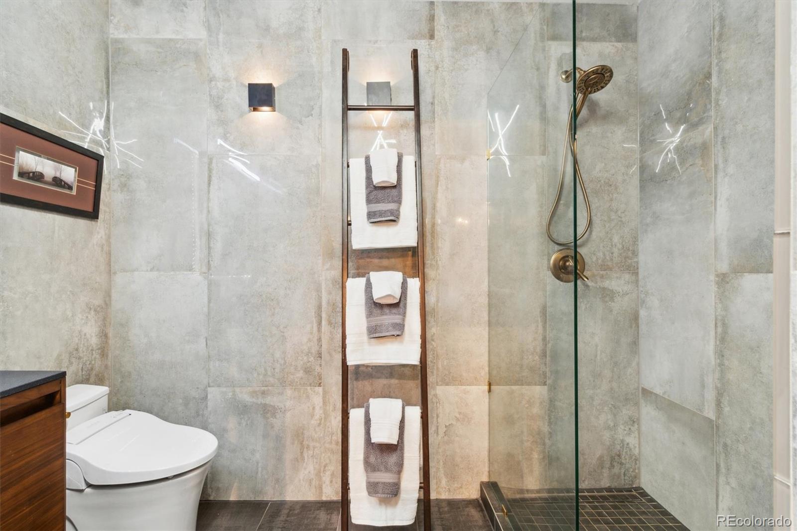 1720 Wazee Street, Unit 2B Denver, CO 80202 - Photo 16 of 17 a bathroom with a toilet and a shower