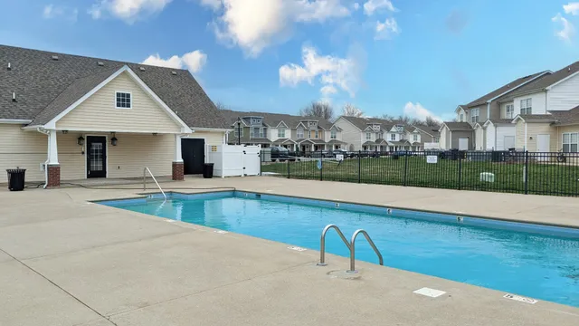 a view of a house with a swimming pool