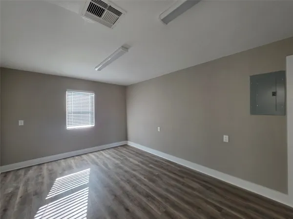 an empty room with windows