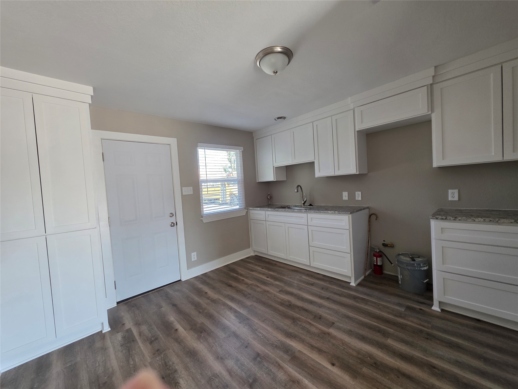 13379 Force Street Houston, TX 77015 - Photo 19 of 21 a kitchen with a refrigerator and window
