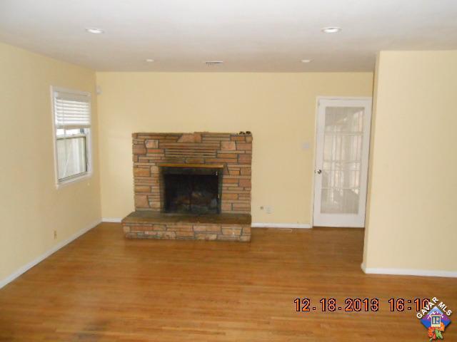 421 West Ave J 9 Lancaster, CA 93534 - Photo 2 of 7 a view of an empty room with glass door