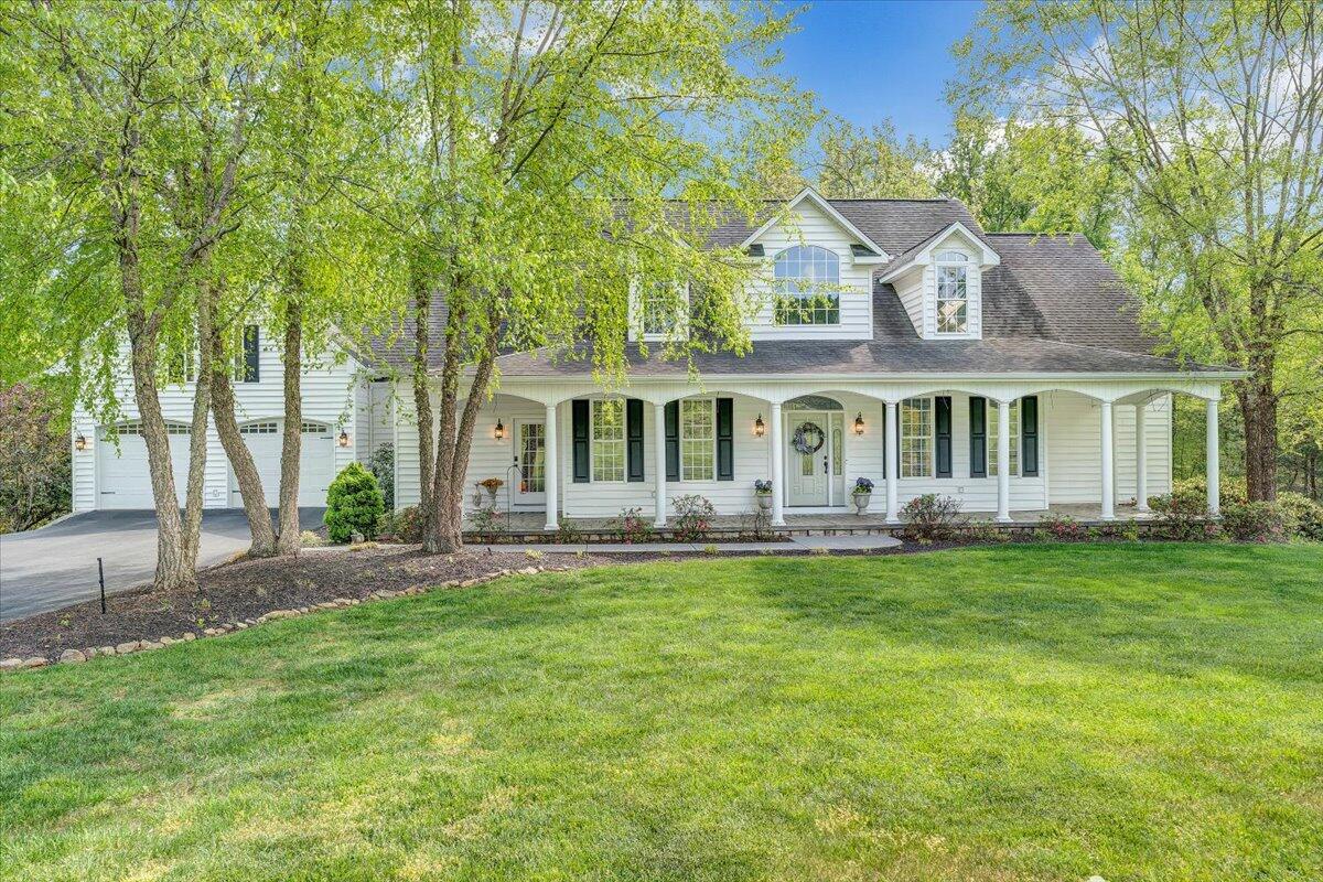 46 Claybrook Court Blue Ridge, VA 24064 - Photo 1 of 76 a front view of a house with a garden