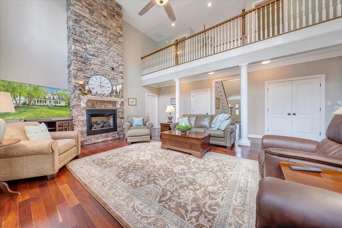 46 Claybrook Court Blue Ridge, VA 24064 - Photo 14 of 76 a living room with furniture a fireplace and a table