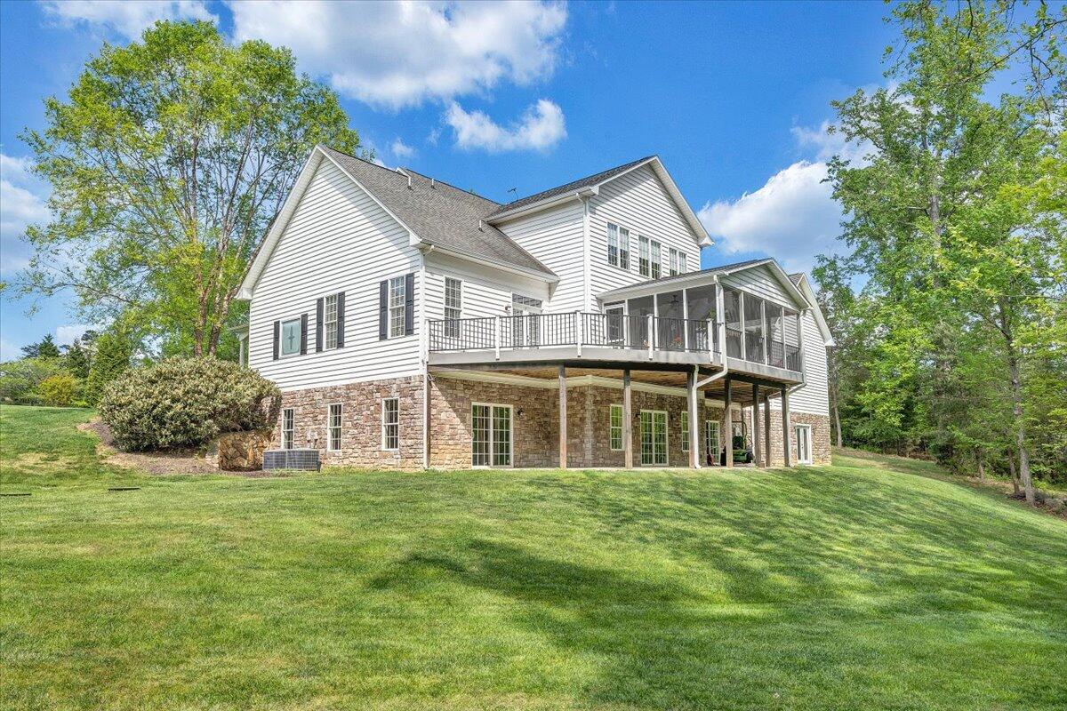 46 Claybrook Court Blue Ridge, VA 24064 - Photo 2 of 76 a front view of a house with a yard