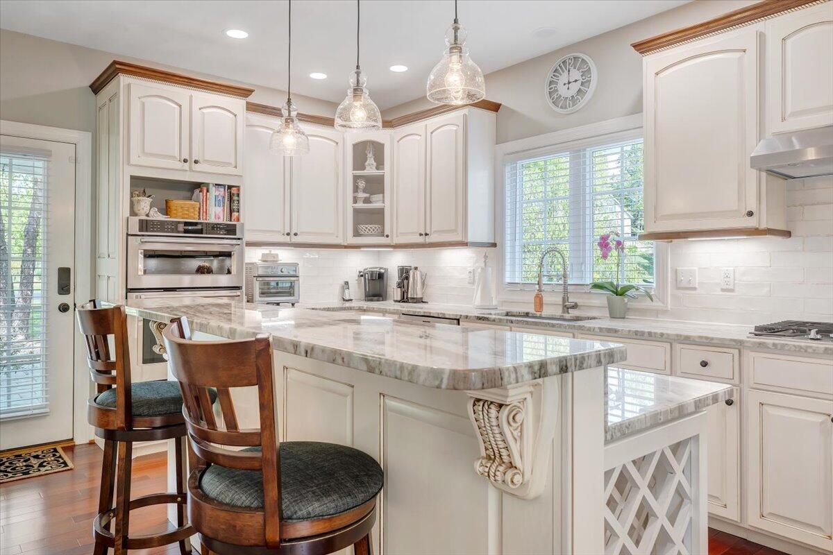 46 Claybrook Court Blue Ridge, VA 24064 - Photo 21 of 76 a kitchen with stainless steel appliances granite countertop a sink stove and cabinets
