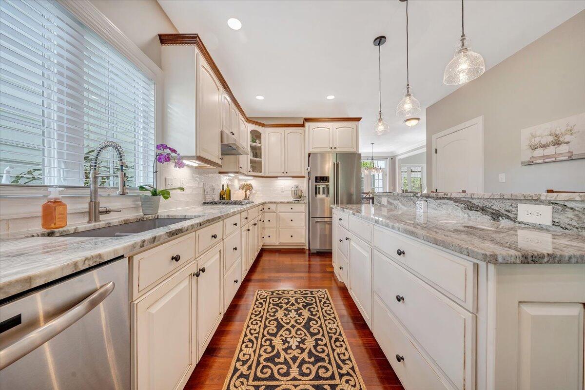 46 Claybrook Court Blue Ridge, VA 24064 - Photo 25 of 76 a large kitchen with kitchen island a large counter space a sink and stainless steel appliances