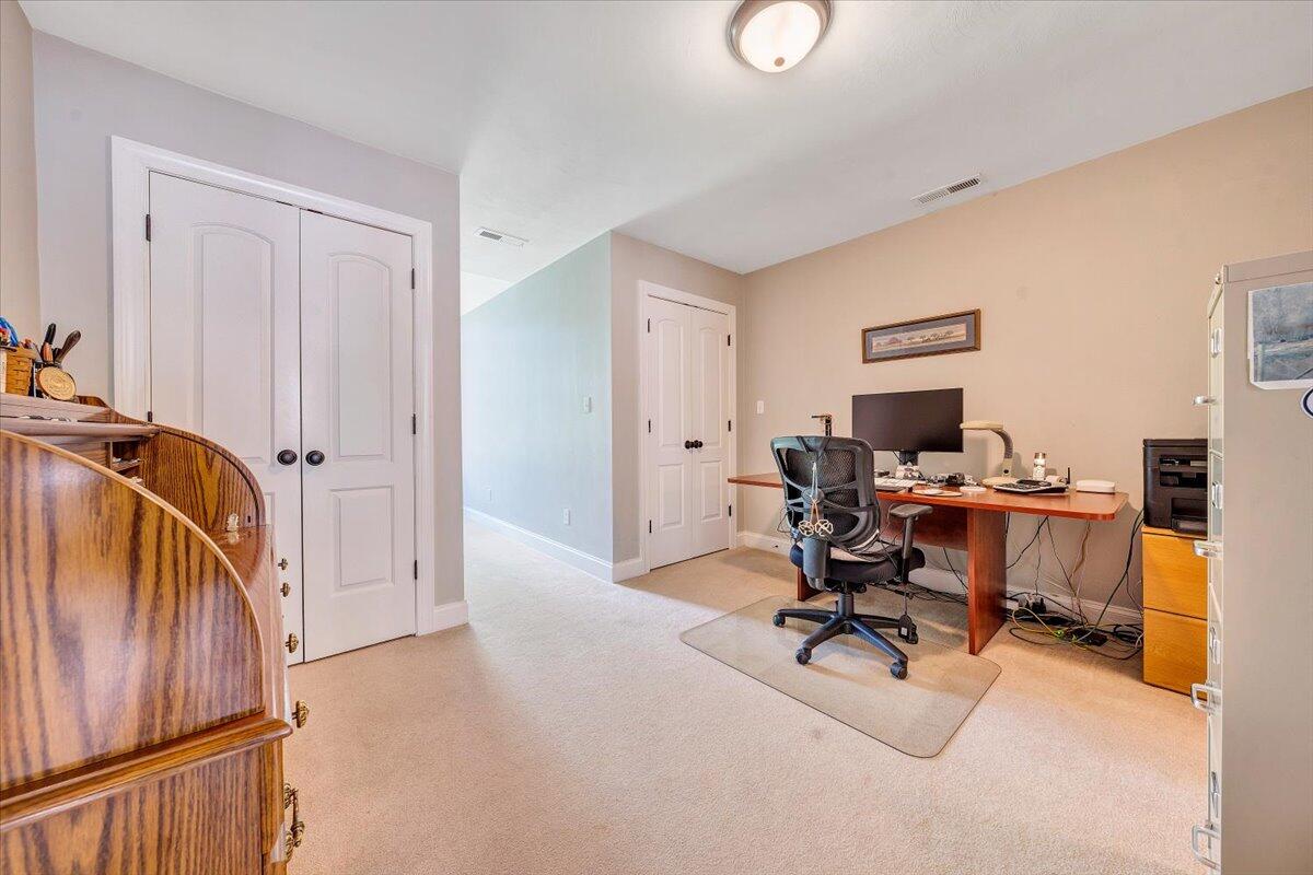 46 Claybrook Court Blue Ridge, VA 24064 - Photo 45 of 76 a view of a workspace with furniture and a window