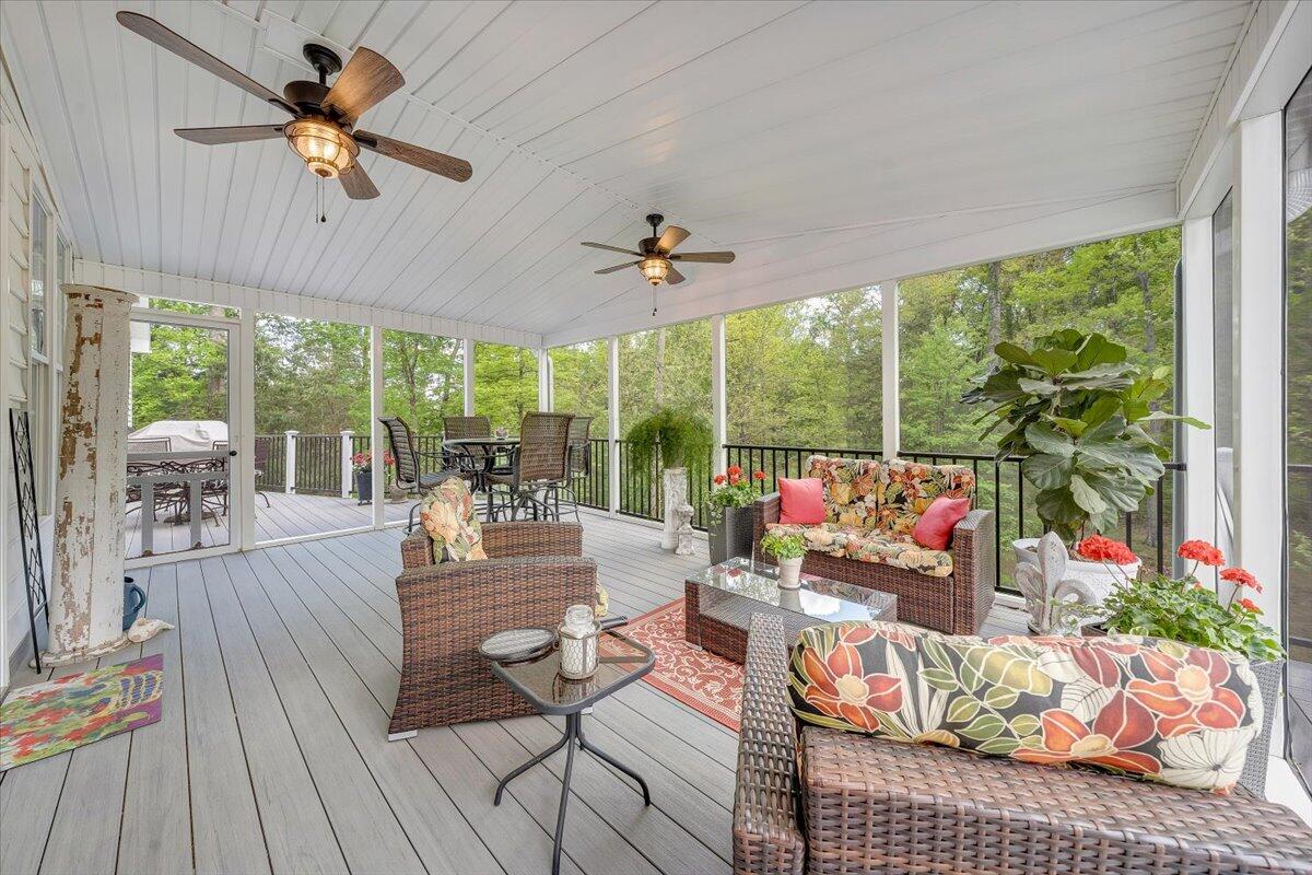 46 Claybrook Court Blue Ridge, VA 24064 - Photo 62 of 76 a living room with patio furniture and a large window