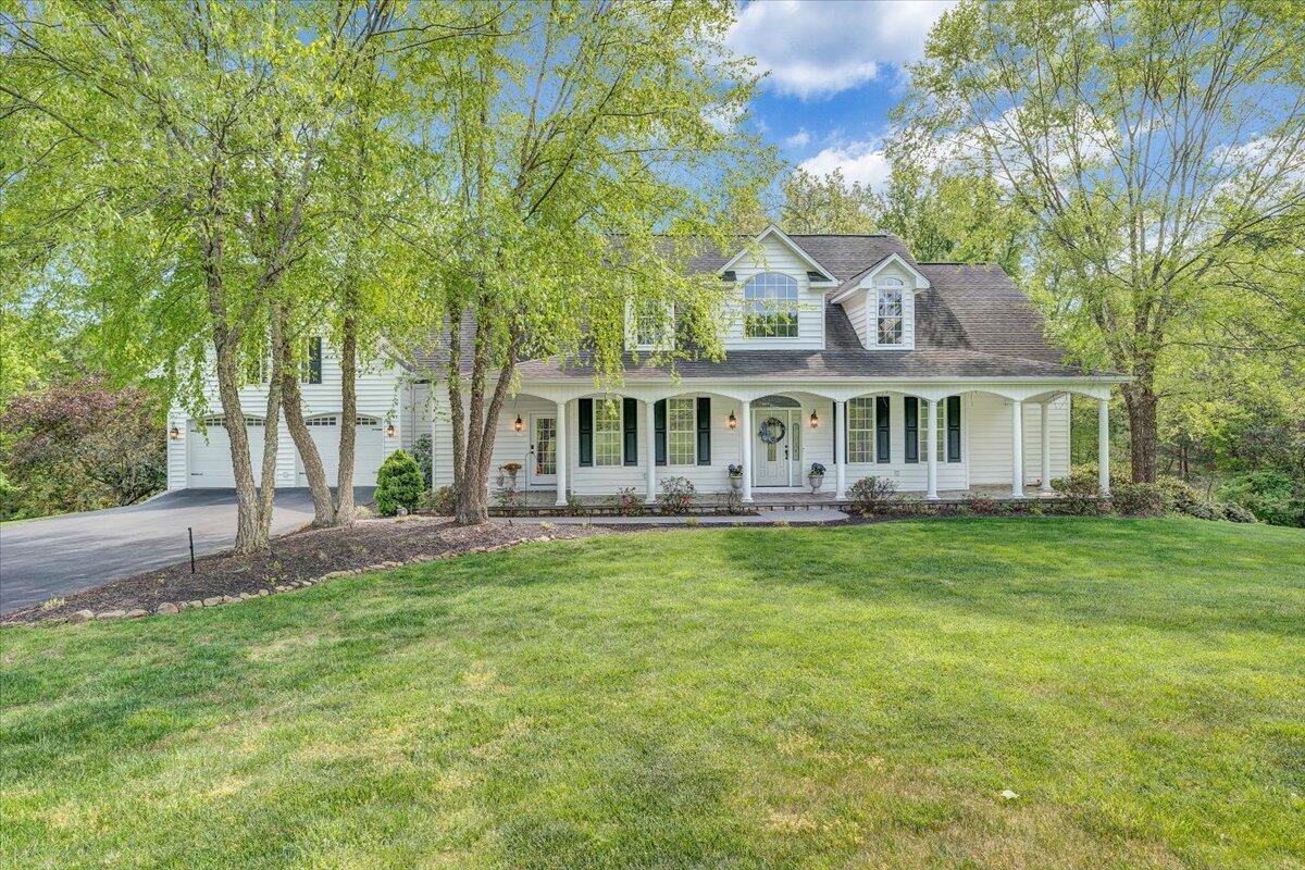 46 Claybrook Court Blue Ridge, VA 24064 - Photo 67 of 76 a front view of a house with a garden