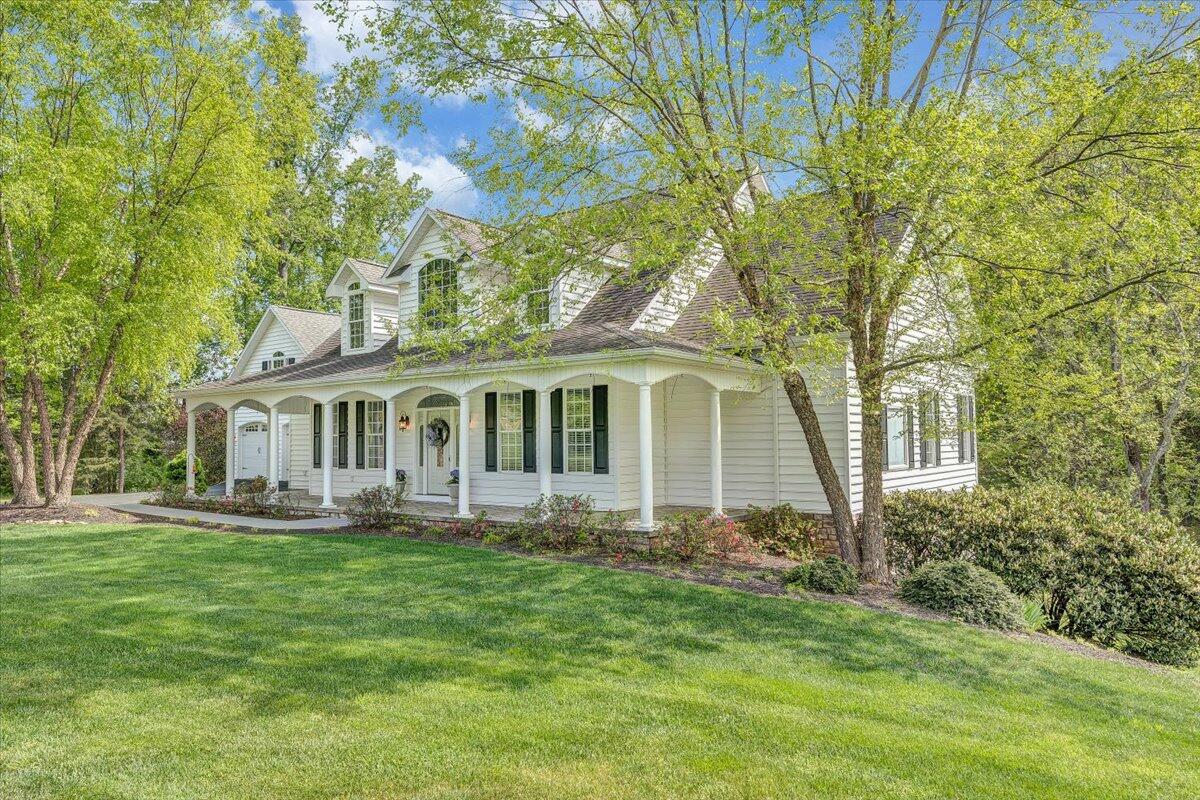 46 Claybrook Court Blue Ridge, VA 24064 - Photo 69 of 76 a front view of a house with a garden