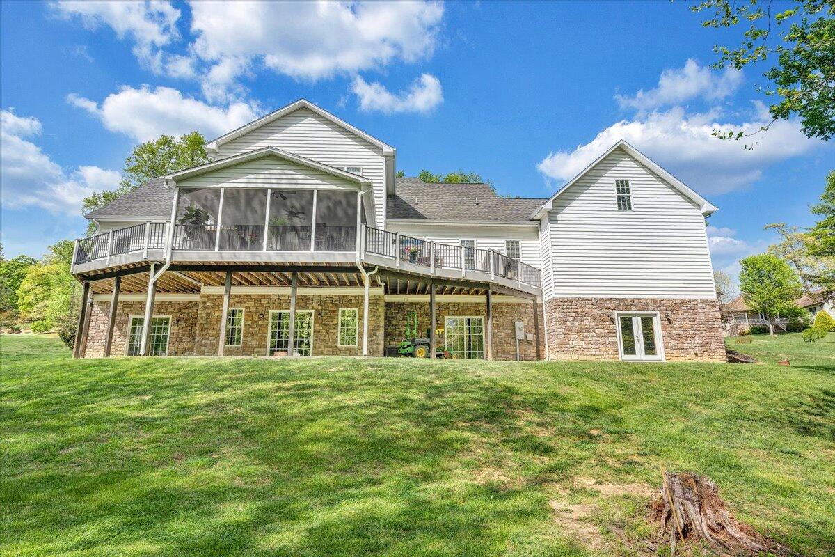 46 Claybrook Court Blue Ridge, VA 24064 - Photo 74 of 76 a front view of a house with a yard
