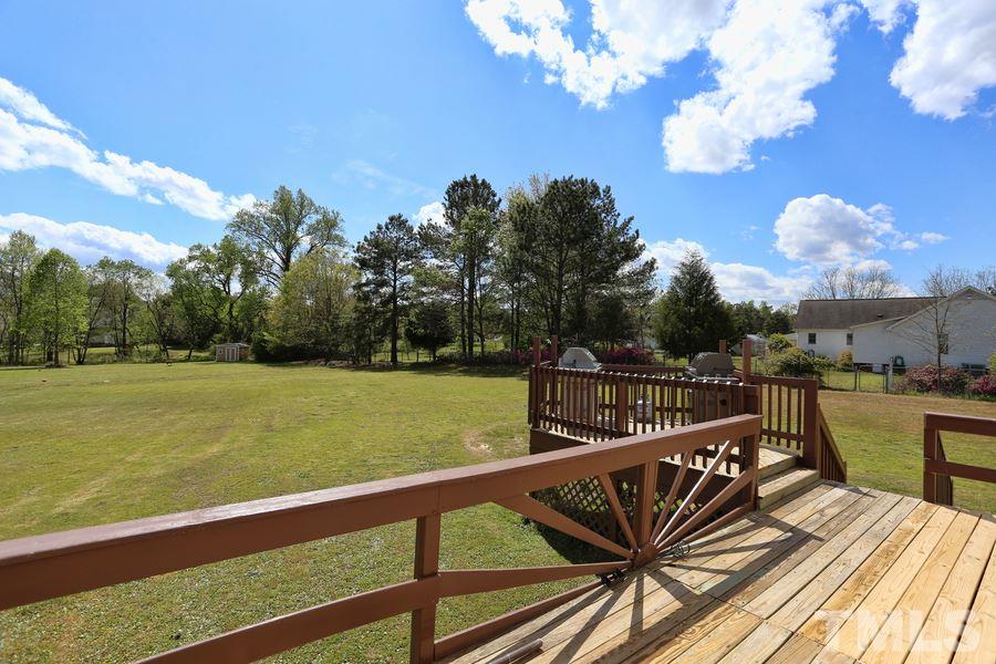 236 Hunters Farm Drive Raleigh, NC 27603 - Photo 18 of 21 a view of a balcony with lake view