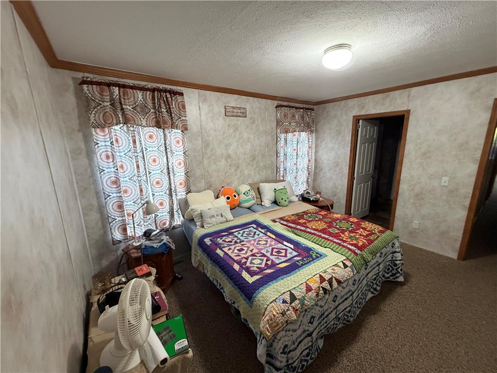 12 Springridge Road Bath, PA 18014 - Photo 47 of 61 A restful chamber with soft carpeting, providing a comfortable retreat.